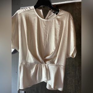 Express sz sm taupe sold out top in satiny soft fabric. GORGEOUS